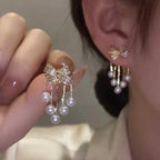 Paved Bow Pearl Tassel Earrings in Zinc Alloy