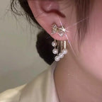 Paved Bow Pearl Tassel Earrings in Zinc Alloy