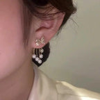 Paved Bow Pearl Tassel Earrings in Zinc Alloy